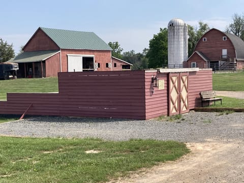 Party Patio, with hot tub, corn hole, other games, firepit, patio furniture. 