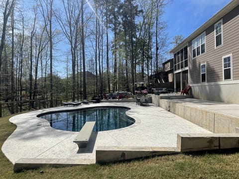 Updated backyard 2021: gunite pool, firepit, separate seating area with TV. 