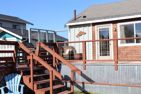 Large entry deck with seating to take advantage of views of Bay and lagoon.