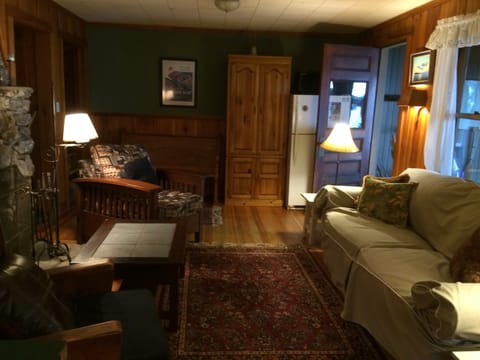 View of LR. Large Screen TV located where pine cabinet is.