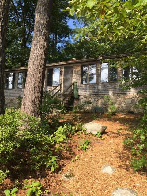 Front exterior of cottage as taken from the dock, steps away.