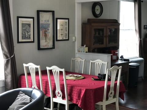 Living room with history and current amenities. hi speed wifi/streaming avail.