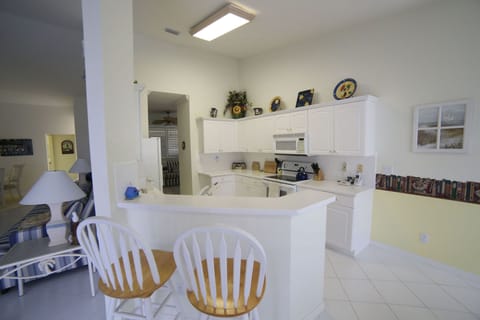 Another view of the kitchen from the breakfast bar. 
