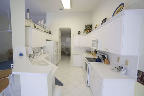 Clean kitchen with everything you need to cook at home. 