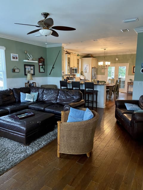 View from the living room into the kitchen, extra seating at the bar