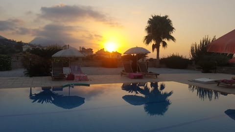 Sunset From Pool Area
