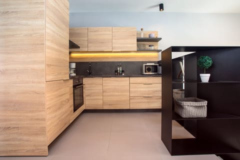 fully equipped kitchen next to the living area