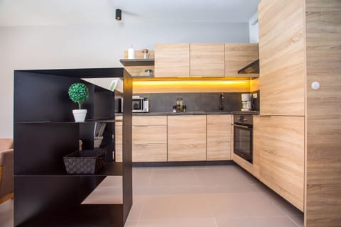 fully equipped kitchen next to the living area