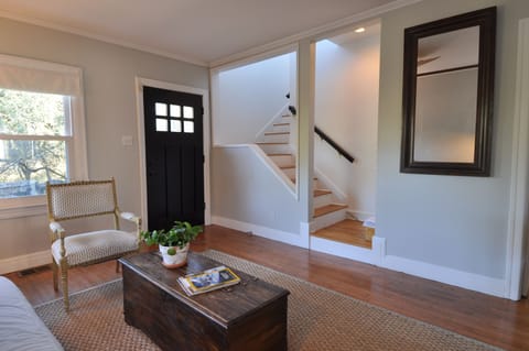 Front Entrance and Living Room with staircase to 2 story.