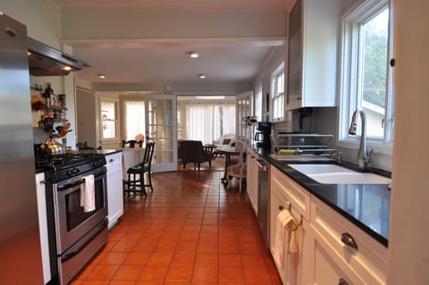 The fully stocked Galley Kitchen is open and fun for groups large or small.