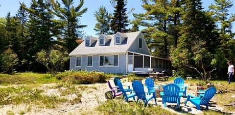 Lake front yard with  sandy bottom beach 