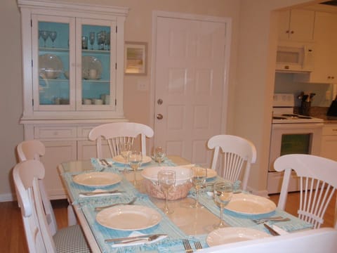 The dining room table can seat up to 8 people.