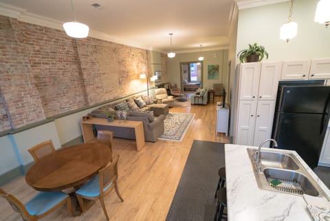 Exposed brick wall adds to the historical feel