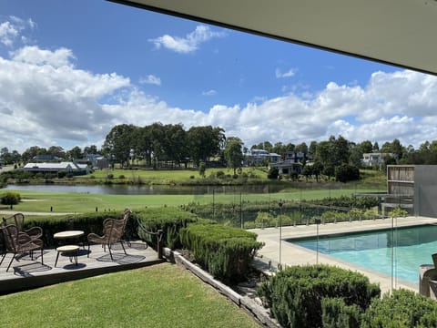 Relax on the deck or swim in the  pool whilst watching the golfers play