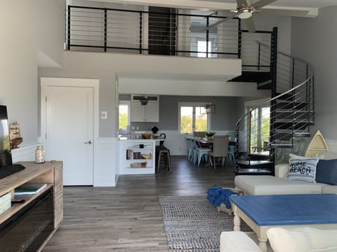 Living room which opens to kitchen and dining area