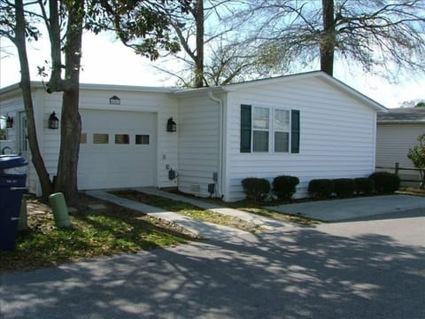 Street side view with garage