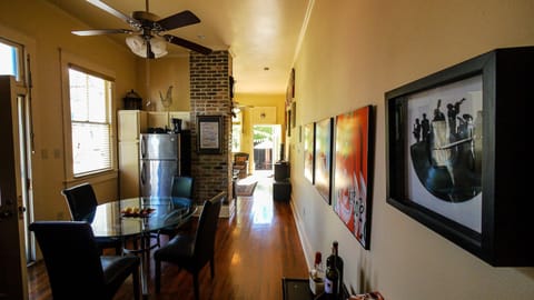 Traditional shotgun architecture: kitchen, living room, private courtyard out.