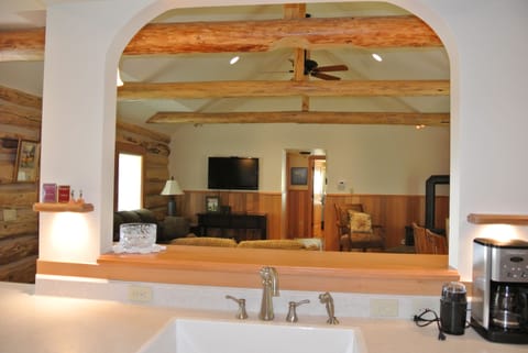 Herbeau farm sink with arch looking into living room