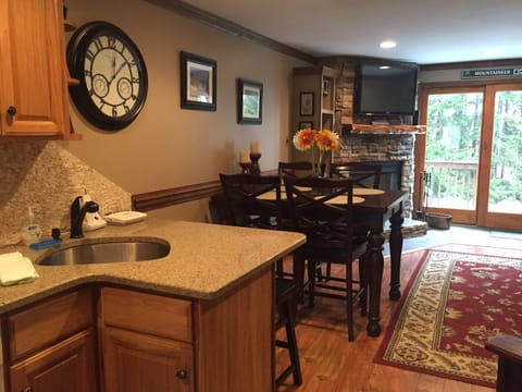 Kitchen open to dining and living area