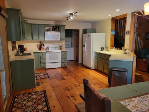 Brand newly updated kitchen, appliances, wide open floor plan to dining/living