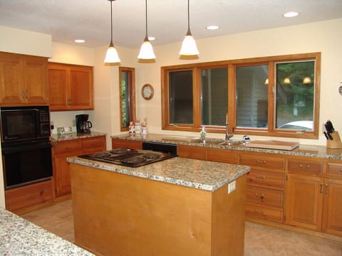 Renovated kitchen with granite countertops