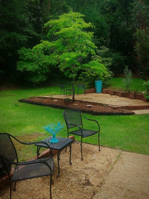 Private wooded backyard. No house is to the right of the property