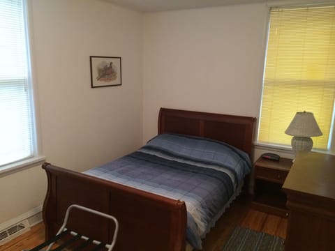 first floor bedroom with attached bath