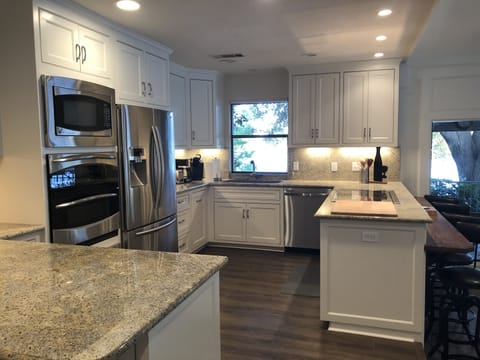 Gourmet kitchen - loaded with cooking utensils and gear