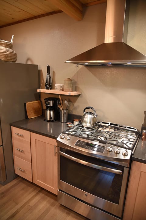 We love the stove. Check out the hood.  The stories we could tell about install.