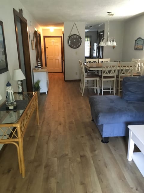 Living Room Dining Room  Area with view of main entry and kitchen entry