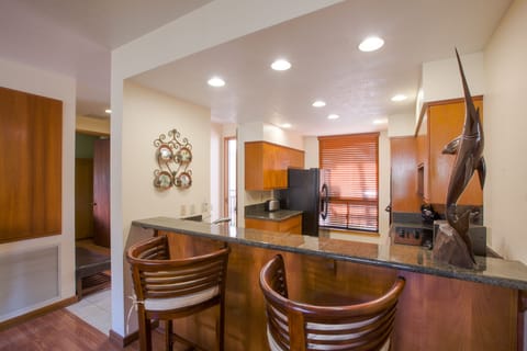 Comfortable additional seating at the breakfast bar.