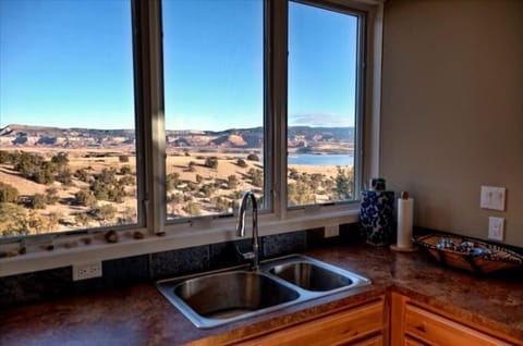 The kitchen overlooks Abiquiu Lake and Ghost Ranch