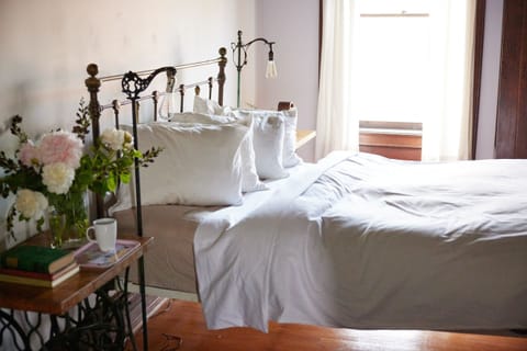 closeup of queen sized bed in the main bedroom