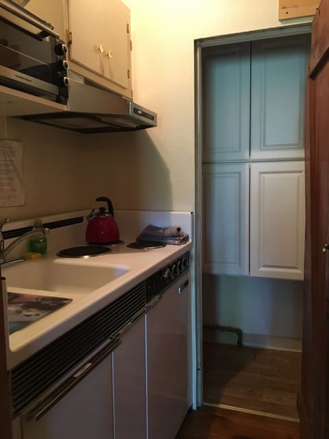 Kitchenette and extra cabinets.