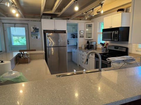 Kitchen view to pantry area and exit to rear bluestone patio.