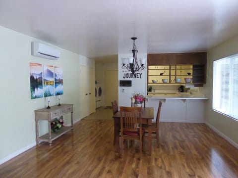 Brand new floors in the bright dining area.