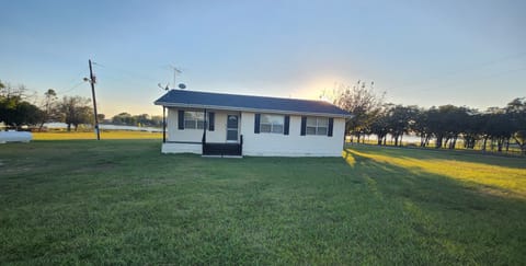Front of Lake House with Lake Views with a fenced pet friendly 2 Acres 