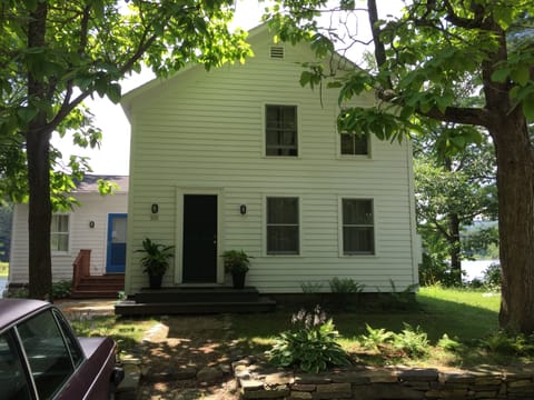 Yor private entry is the black/green door at front of the house.