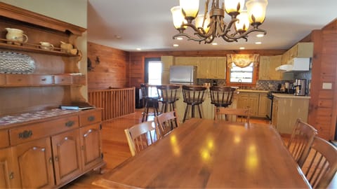 Dining Area For Six With An Additional Seating For Four At The Large Island.