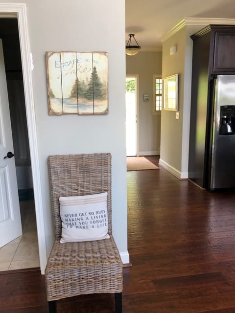 Hallway to front door and to the loft bedroom suite