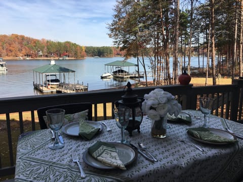 Enjoy dining on back deck with friends and family with beautiful view of lake