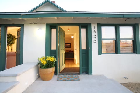 Right door is the front entry and master bedroom door is the left most door