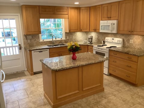 Granite counter tops and tile backsplash