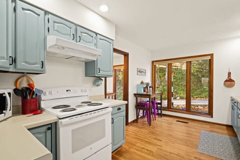 Updated Kitchen with microwave, coffee makers, and many kitchen accessories.