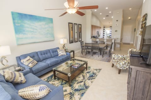 Living room with seating for six and flat screen television with cable TV
