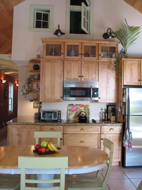 High ceilings in the 2 living rooms! Here's part of the kitchen/dining