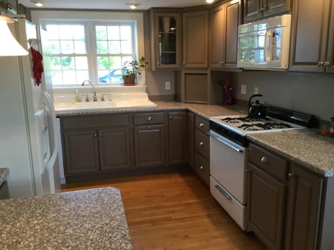 Kitchen from the washer and dryer, also showing the 5' cast iron sink/drainboard