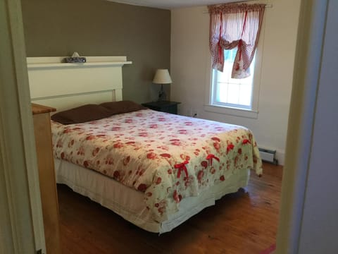 The 2nd bedroom with a queen bed also on the 1st floor.