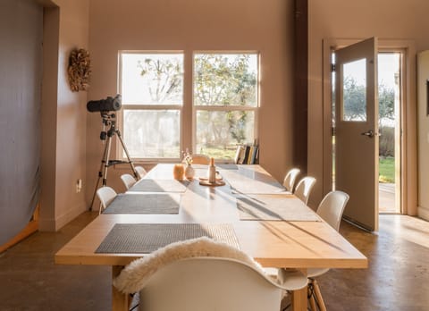Inside dining table for small gatherings accompanied by Heath ceramics.