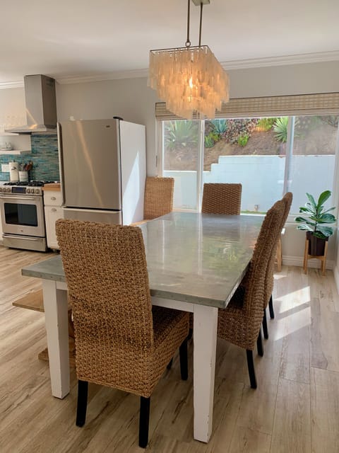 Dining table with zinc top and seating for 8 people